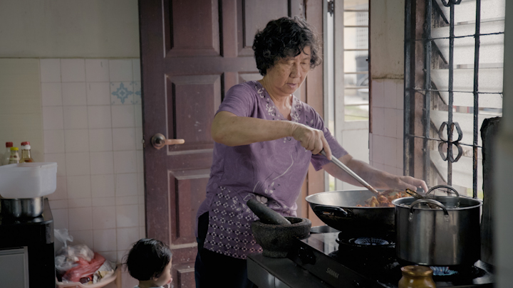 Teoh Beng Hock’s mother cooking rendang chicken, one of Beng Hock’s favourite dishes.