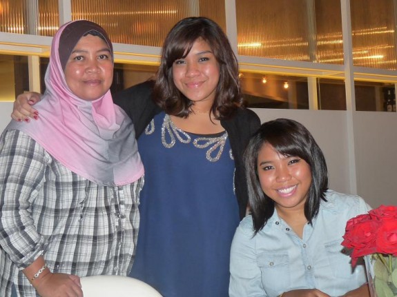 Nurlyn, after her makeover, with her mother and sister