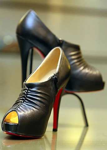 Stylish black booties are great for formal dos 