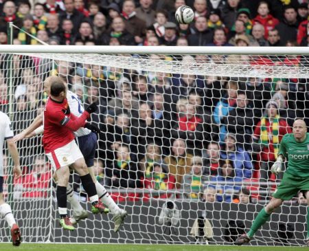 Wayne Rooney's perfectly arced header, his seventh in eight games, decided the League Cup final.