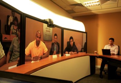 That's what the TelePresence facility in Cisco's office looks like, and that's LA Lakers' star Derek Fisher in the middle.