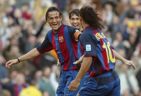 Luis Enrique (left) celebrating a goal with Ronaldinho and Luis Garcia during his Barcelona days. He might be a Barca legend now, but he actually made his name with their bitter rivals Real Madrid during five seasons there.