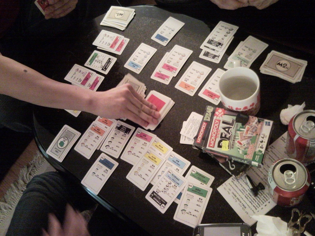 Monopoly Deal Card Game in session