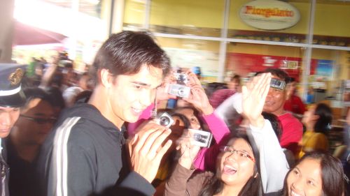 Former Chelsea academy player James Younghusband being mobbed by fans at SM Mall in Baguio City, Philippines. James and his brother Phil are now celebrities in the Philippines thanks to their model good looks.