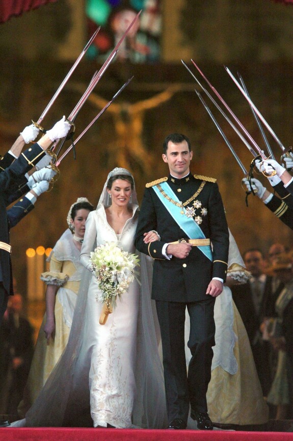 Spain's Crown Prince Felipe and his new wife Letizia Ortiz as they leave the Almundena Cathedral in Madrid Saturday May 22, 2004 after their wedding ceremony