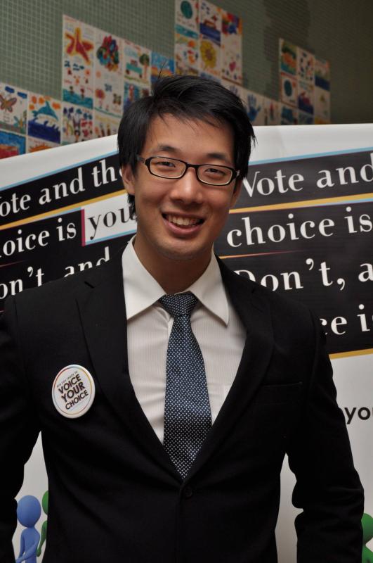 John-Son Oei, 28, a volunteer with Growing Emerging Leaders who are getting youths to register to vote through their Voice Your Choice campaign.