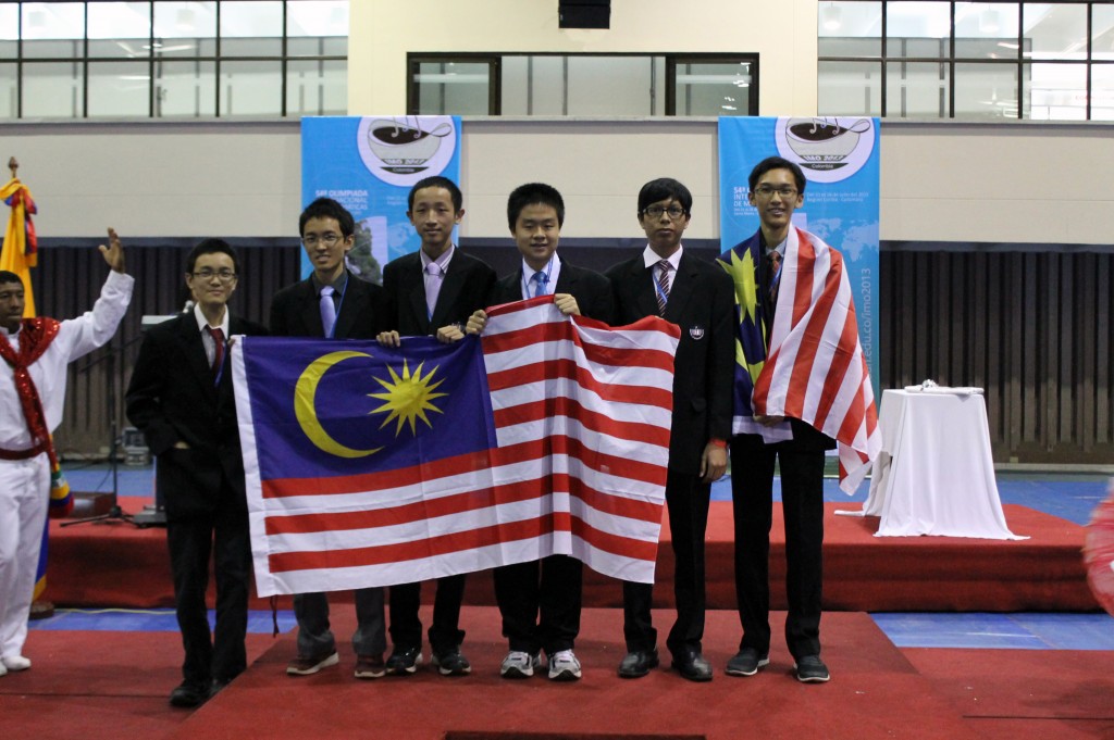 The writer (far right) with his teammates at the IMO 2013.