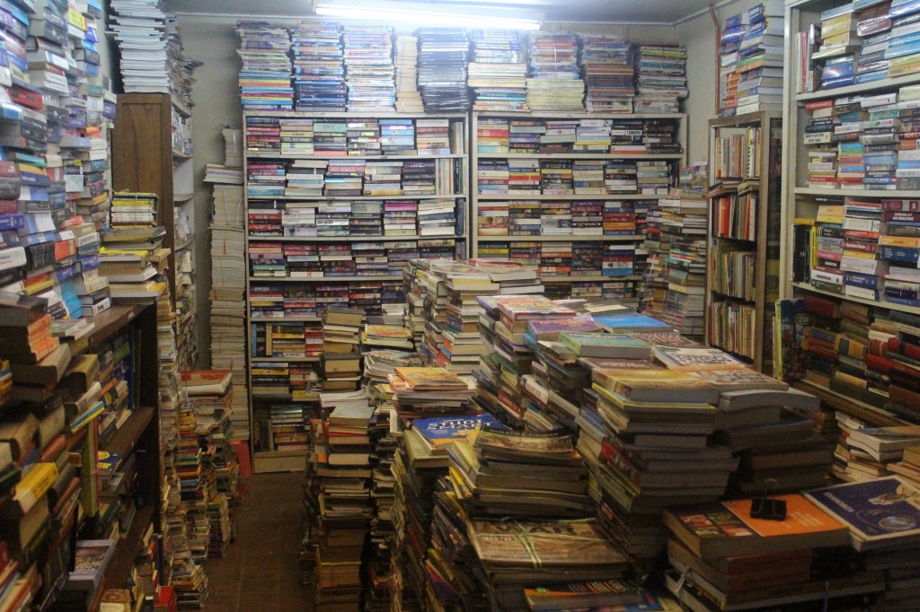 Photo 1 - Gulam attempted to organize his books but in the end it returned to its unkempt state