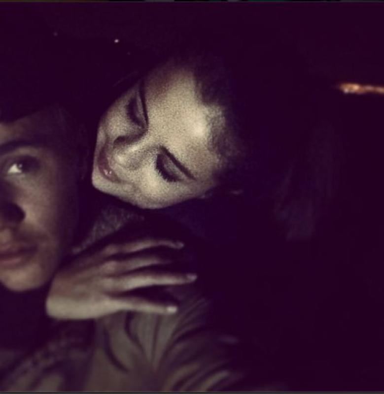  Justin Bieber Instagram-ed a photo of him and Selena Gomez with the caption "Love the way you look at me."