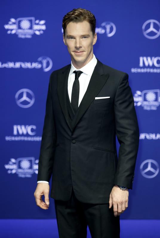 Sharp dresser: Benedict Cumberbatch hosted the 2014 Laureus Awards at Istana Budaya recently and even photo bombed himself through the use of a holographic duplicate.
