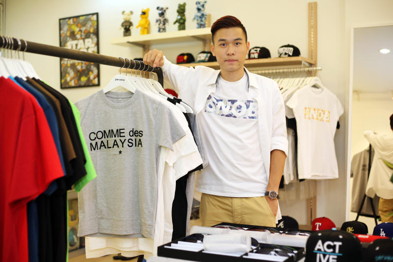 Starting young: Jonathan Yip, posing with his clothing line Comme Des Malaysia, kicked off his venture while in high school.
