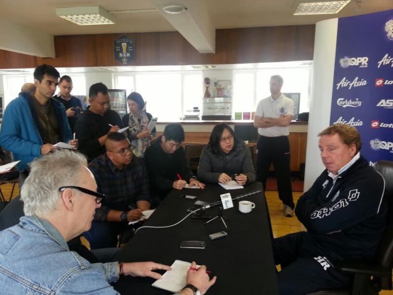 QPR manager Harry Redknapp speaking to reporters, including R.AGE editor Ian Yee (second from right), at QPR's training ground in London.