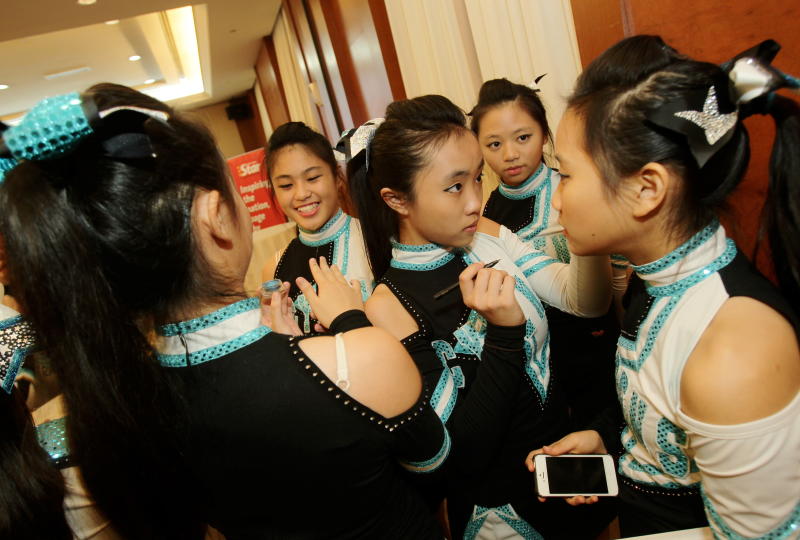 Cyrens cheerleaders getting ready to perform at the CHEER 2014 launch last week.