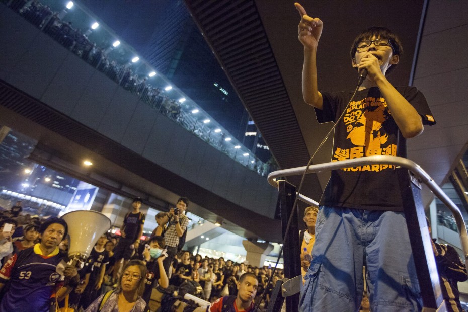 Student leader Joshua Wong, 17, addressing pro-democracy demonstrators in front of the Hong Kong government offices on day three of the mass civil disobedience campaign Occupy Central, in Hong Kong, China