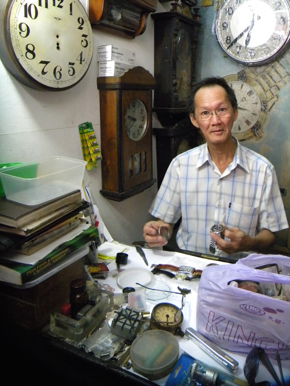 Watch man: Watch repair expert Chan Kim Wah learned his skills from his father, at the very same workshop he currently runs on Malacca