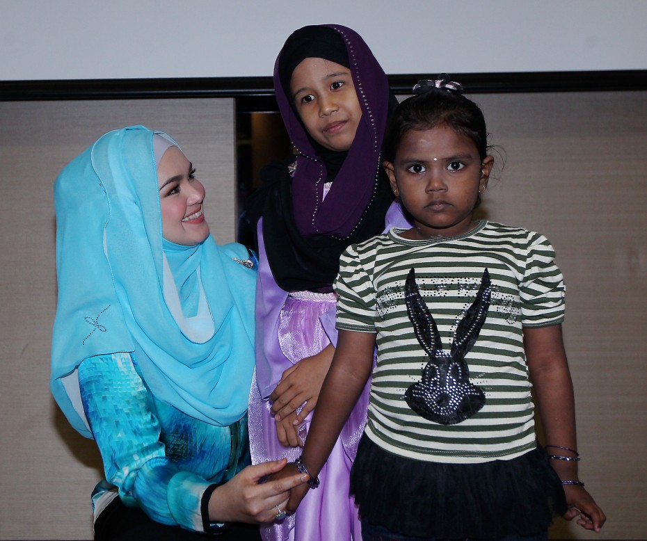 Siti poses with (from right) Logasree Vijayan, 4 and Aida Zakiah Mohamed Amin, 8, who have completed their surgery while 13-year-old Andrew Lim (not present) was advised to rest ahead of his upcoming operation.
