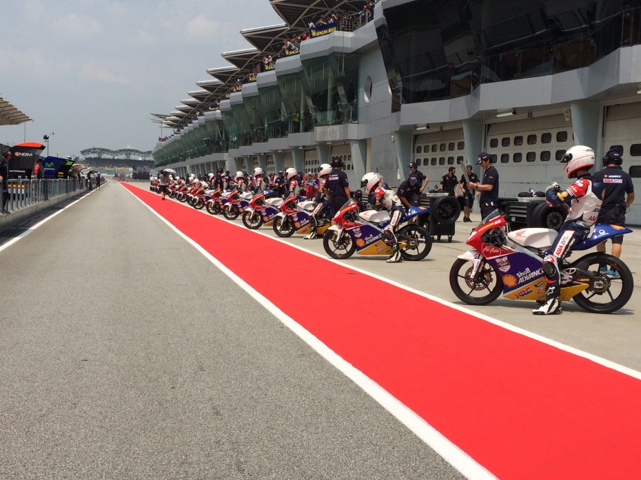 The Asia Talent Cup riders wait patiently for their race to begin.