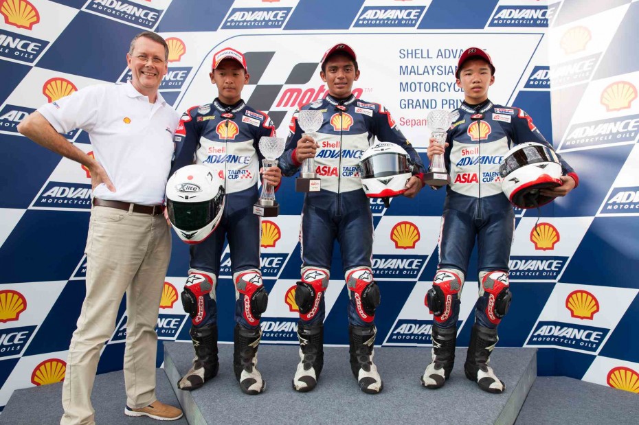 In the fast lane: At the recent MotoGP weekend, a Malaysian rider managed to top the podium - 18-year-old Shafiq Rasol (second from right). Shafiq finished first on Day One of the 2014 Shell Advance Malaysian Motorcycle Grand Prix, and finished fifth overall in the Shell Advance Asia Talent Cup (ATC). - Dorna Sports SL
