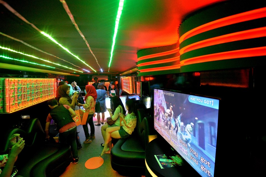 The interior of the party bus looks like the inside of a very glitzy club.