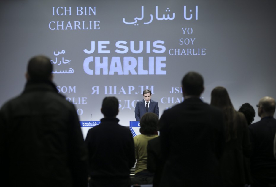 "Je Suis Charlie" displayed in several languages during a minute of silence at the main press room of the European commission in Brussels, Belgium. -- Photo by EPA
