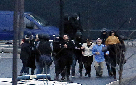 More hostages were evacuated after the French police special forces launched the assault. -- Photo by AFP