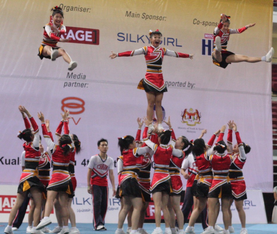 The Titans from SMJK Ave Maria Convent Ipoh performing a stunt during their routine at Cheer 2009. The girls from Ipoh were disappointed despite a fourth-place finish. 