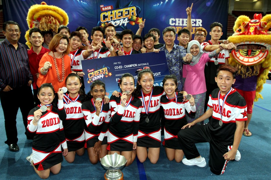 First-time winners Zodiac Co-Ed from SMK Kepong with their CHEER 2014 Co-Ed category champion's trophy. 