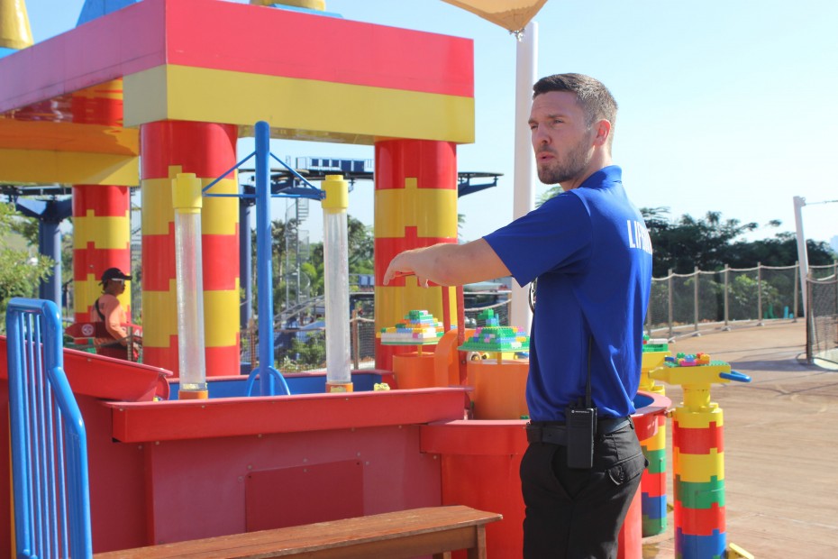 Besides the guests' safety, Harrison aims to educate the kids by expanding their imagination and creativity. Here, he is at the Imagination Station, where kids are encouraged to build Lego models out of the DUPLO bricks.