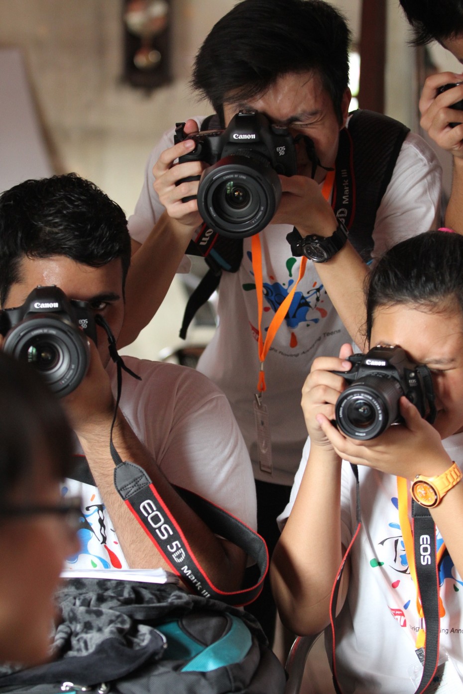 Some of the participants putting their new-found photojournalism skills to the test.
