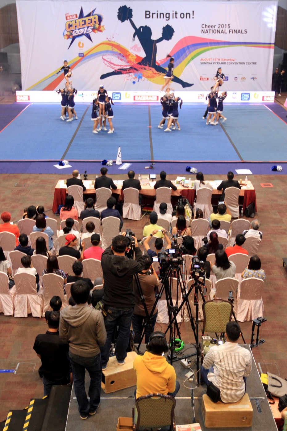 The video crew worked non-stop, making video after video of each of the 39 team's three-minute routines. This was then edited and uploaded on the R.AGE website in less than 10 minutes. -- Photo: SAM THAM/The Star