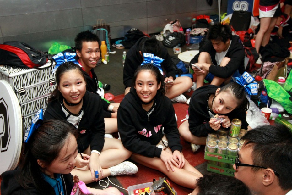 The cheerleaders spent a lot of time practising and waiting for their turn on the mat, but were kept refreshed with the help of Pokka green tea.