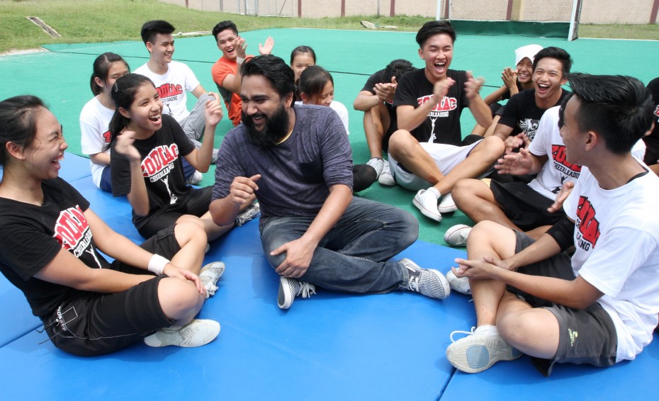 Comedian Prakash became serious as he talked about his team's hard work preparing for the finals. 'I know they've been busy practising their routine, so no matter the outcome I'm very proud of them.' -- Photo: SAMUEL ONG/The Star