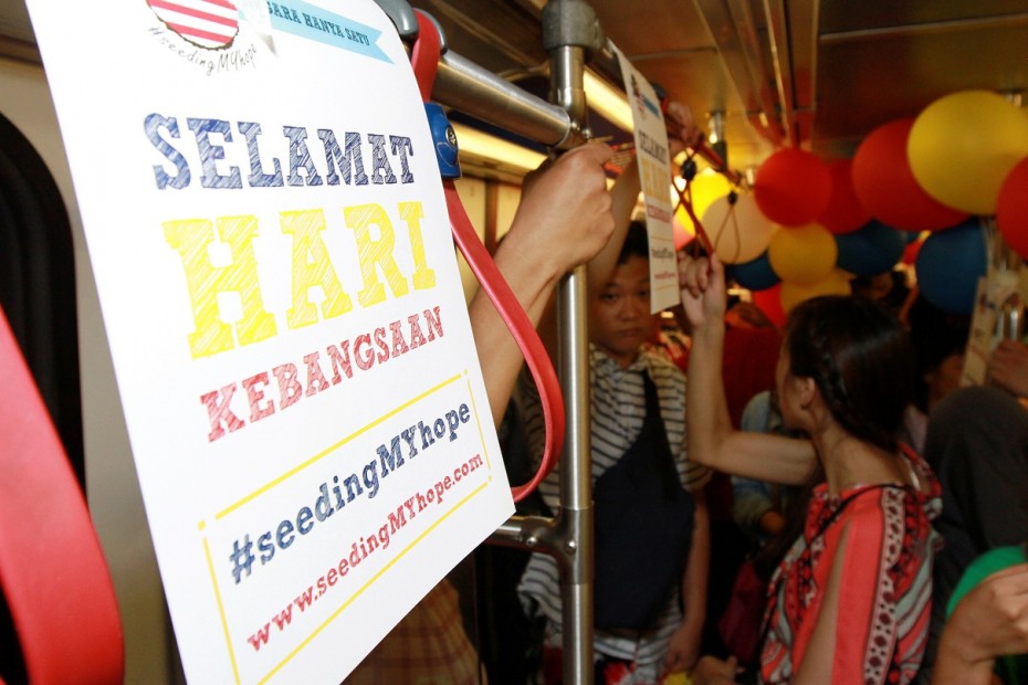 The trains were decorated with posters and balloons in conjunction with National Day. Photo: LOW LAY PHON/The Star