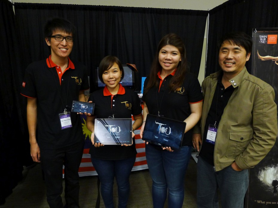 Team SwinDesign with their Tou: the Sacrifice game. From left: Landon Chia, Sim Jia Ying, Stella Wang and John Hii. 